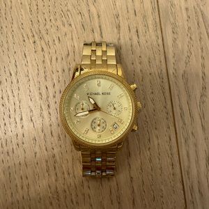 Michael kors gold women’s watch
